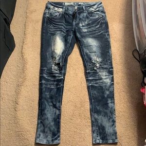 Medium wash distressed skinny jeans